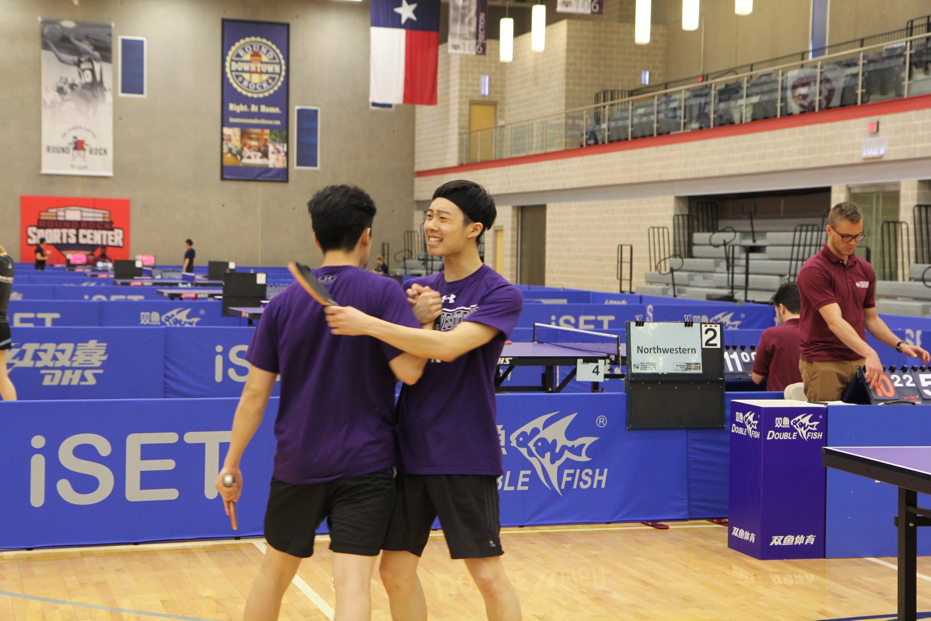 ryan and david from northwestern table tennis celebrating an epic doubles comeback